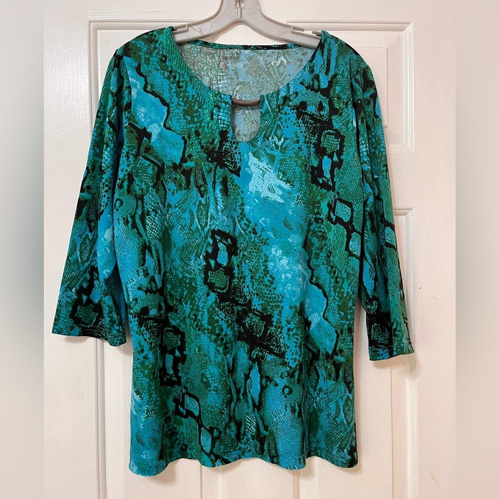 Emerald Animal print blouse with interesting details